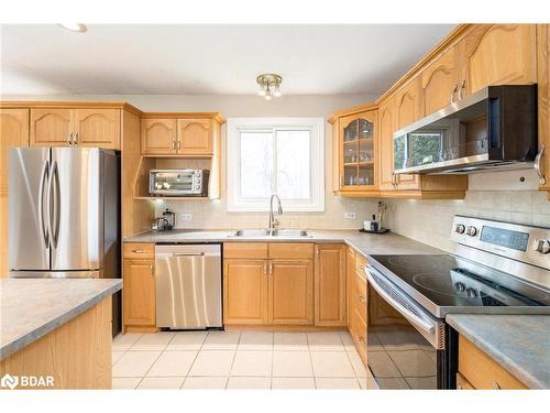 23 Greengables Drive, Hawkestone, ON - Indoor Photo Showing Kitchen With Double Sink