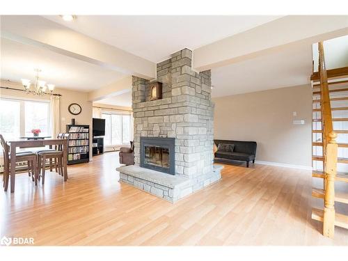 23 Greengables Drive, Hawkestone, ON - Indoor Photo Showing Living Room With Fireplace