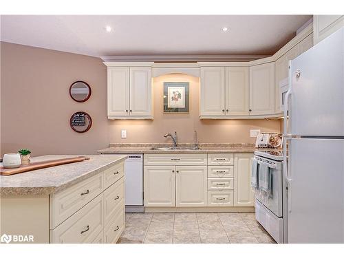 82 Greenway Drive, Wasaga Beach, ON - Indoor Photo Showing Kitchen With Double Sink