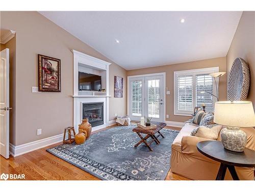 82 Greenway Drive, Wasaga Beach, ON - Indoor Photo Showing Living Room With Fireplace