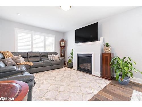786 Ney Avenue, Tay, ON - Indoor Photo Showing Living Room With Fireplace