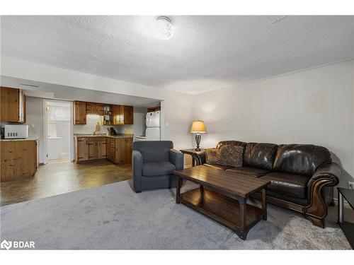2160 Snow Valley Road, Springwater, ON - Indoor Photo Showing Living Room