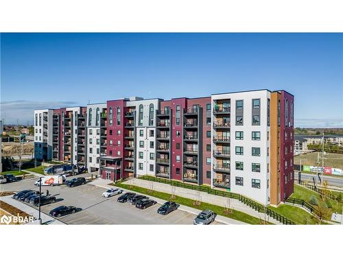 302-4 Spice Way, Barrie, ON - Outdoor With Facade