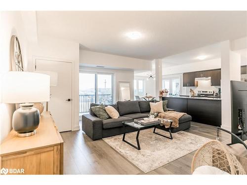 302-4 Spice Way, Barrie, ON - Indoor Photo Showing Living Room