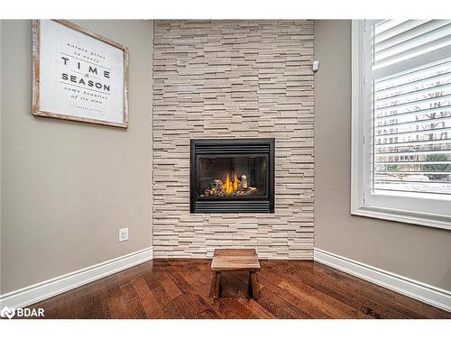 18 Black Creek Trail Trail, Springwater, ON - Indoor With Fireplace