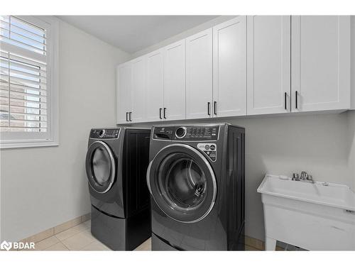 53 Sanford Circle, Springwater, ON - Indoor Photo Showing Laundry Room