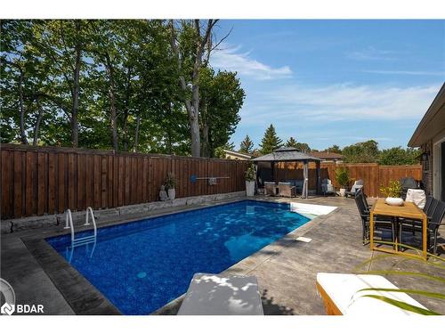 12 Pacific Avenue, Barrie, ON - Outdoor With In Ground Pool With Backyard