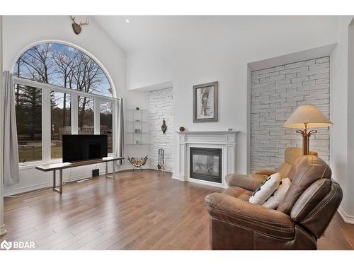 23 Christy Drive, Wasaga Beach, ON - Indoor Photo Showing Living Room With Fireplace