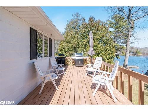 7817 Oakridge Drive, Washago, ON - Outdoor With Body Of Water With Deck Patio Veranda With Exterior