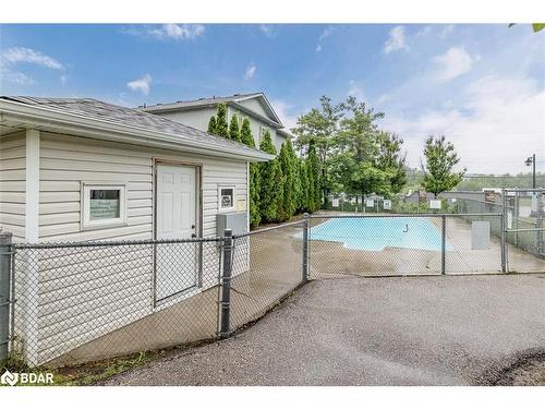 121-800 West Ridge Boulevard, Orillia, ON - Outdoor With In Ground Pool With Exterior