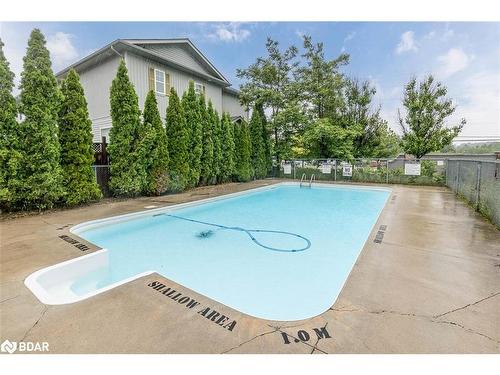 121-800 West Ridge Boulevard, Orillia, ON - Outdoor With In Ground Pool With Backyard