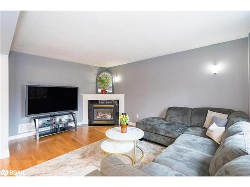 1007 Leslie Drive, Innisfil, ON - Indoor Photo Showing Living Room With Fireplace