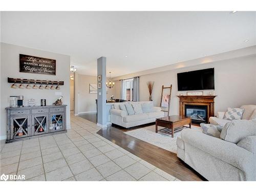 920 Booth Avenue, Innisfil, ON - Indoor Photo Showing Living Room With Fireplace