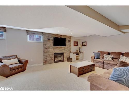 920 Booth Avenue, Innisfil, ON - Indoor Photo Showing Other Room With Fireplace