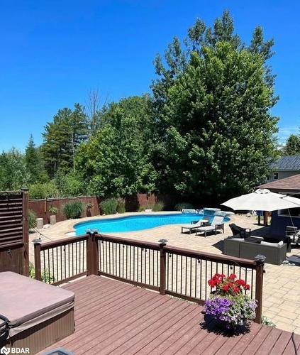 920 Booth Avenue, Innisfil, ON - Outdoor With In Ground Pool With Deck Patio Veranda With Backyard