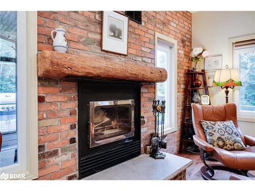 5823 Eighth Line, Hillsburgh, ON - Indoor Photo Showing Living Room With Fireplace