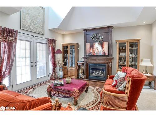 7 Sherwood Crescent, Tiny, ON - Indoor Photo Showing Living Room With Fireplace