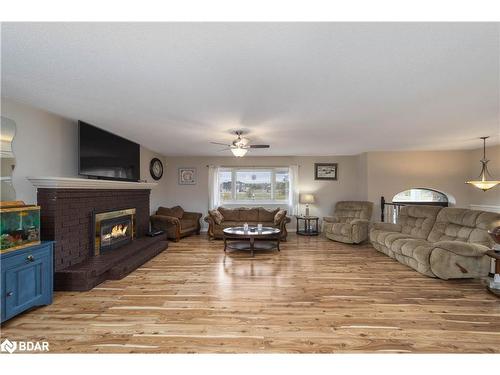3329 New Brailey Line, Severn, ON - Indoor Photo Showing Living Room With Fireplace