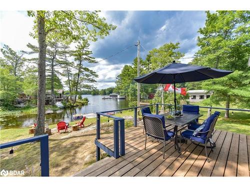 6881 Upper Big Chute Road, Coldwater, ON - Outdoor With Body Of Water With Deck Patio Veranda