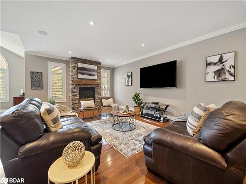 121 Mennill Drive Drive, Springwater, ON - Indoor Photo Showing Living Room With Fireplace