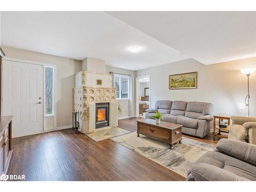 6975 Ortona Road, Essa, ON - Indoor Photo Showing Living Room With Fireplace