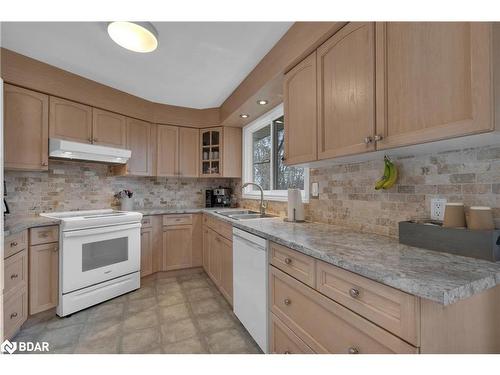 9 Doran Road, Springwater, ON - Indoor Photo Showing Kitchen With Double Sink