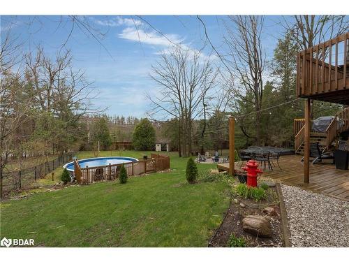9 Doran Road, Springwater, ON - Outdoor With Above Ground Pool With Backyard