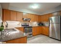110-50 Mulligan Lane, Wasaga Beach, ON  - Indoor Photo Showing Kitchen With Double Sink 