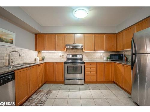 110-50 Mulligan Lane, Wasaga Beach, ON - Indoor Photo Showing Kitchen With Double Sink