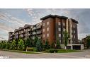 206-100 Dean Avenue, Barrie, ON  - Outdoor With Balcony With Facade 