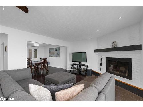 209515 Highway 26, Town Of Blue Mountains, ON - Indoor Photo Showing Living Room With Fireplace
