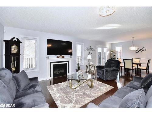 21 Old Trafford Drive, Hastings, ON - Indoor Photo Showing Living Room With Fireplace
