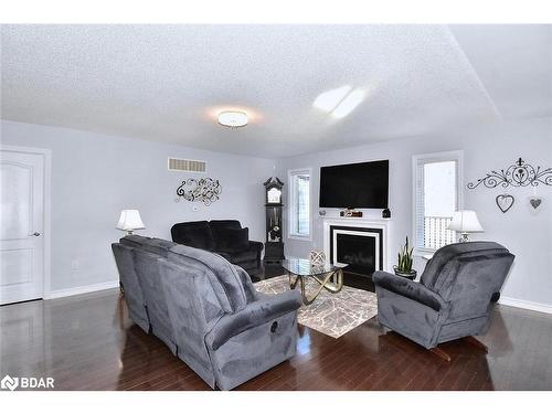 21 Old Trafford Drive, Hastings, ON - Indoor Photo Showing Living Room With Fireplace