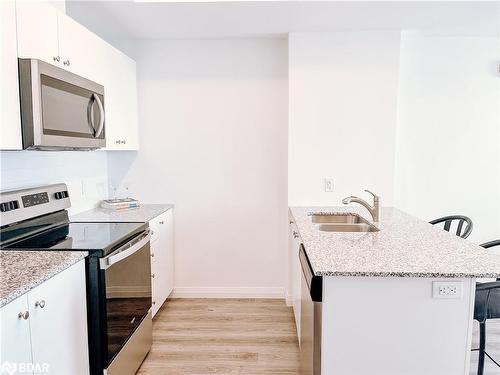 2401-108 Garment Street, Kitchener, ON - Indoor Photo Showing Kitchen With Double Sink With Upgraded Kitchen
