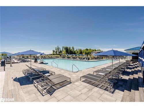 305-241 Sea Ray Avenue, Innisfil, ON - Outdoor With In Ground Pool With View