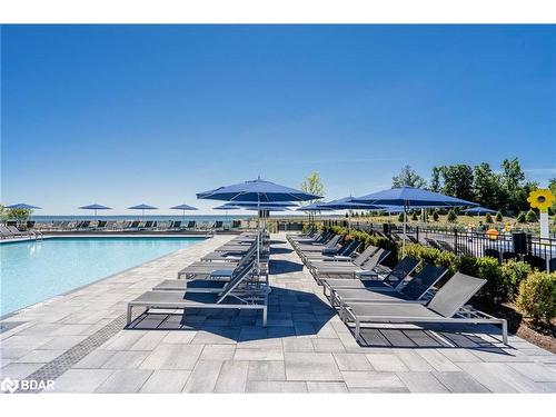 305-241 Sea Ray Avenue, Innisfil, ON - Outdoor With In Ground Pool With View