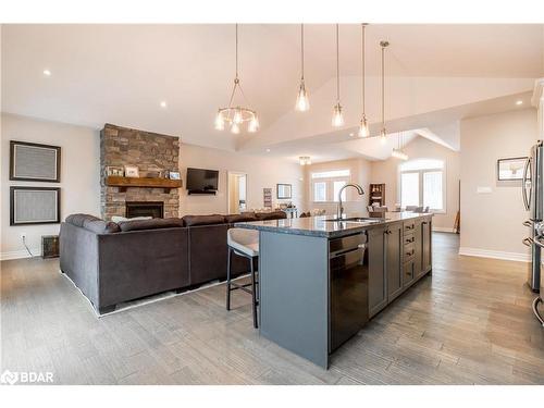 1753 Glen Echo Ridge, Waubaushene, ON - Indoor Photo Showing Kitchen With Fireplace With Upgraded Kitchen