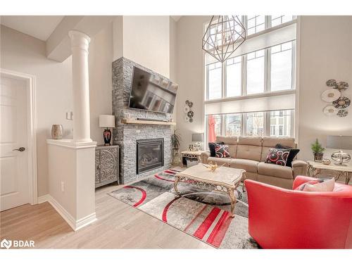 1 Riverwalk Place, Midland, ON - Indoor Photo Showing Living Room With Fireplace