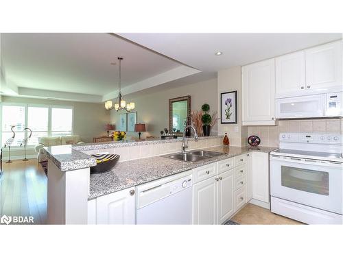 806-6 Toronto Street, Barrie, ON - Indoor Photo Showing Kitchen With Double Sink