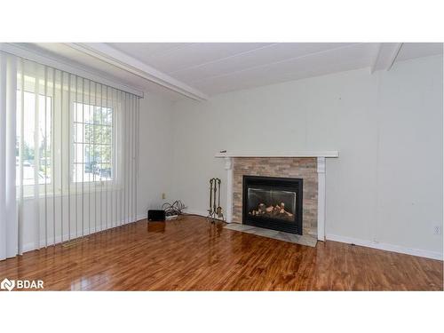 6 Honeysuckle Lane, Innisfil, ON - Indoor Photo Showing Living Room With Fireplace