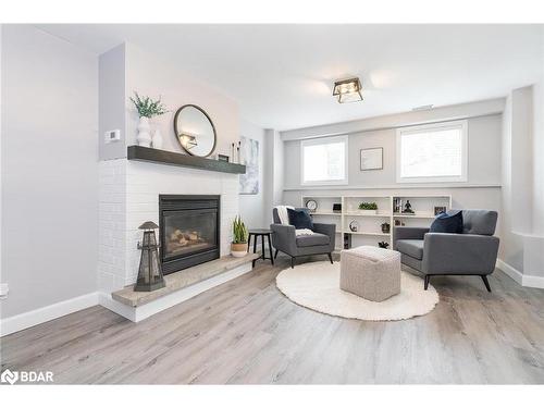 562 Simcoe Street, Collingwood, ON - Indoor Photo Showing Living Room With Fireplace