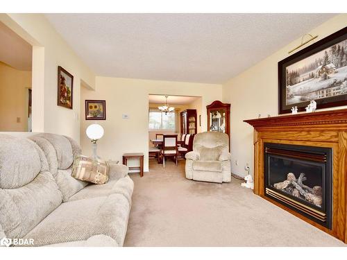 41 Toboggan Hill Drive, Orillia, ON - Indoor Photo Showing Living Room With Fireplace
