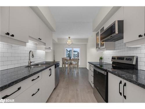 301-20 Koda Street, Barrie, ON - Indoor Photo Showing Kitchen With Double Sink With Upgraded Kitchen