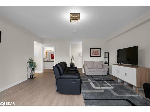 301-20 Koda Street, Barrie, ON - Indoor Photo Showing Living Room