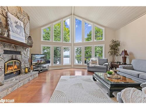 1011 Sugar Bush Road, Dwight, ON - Indoor Photo Showing Living Room With Fireplace