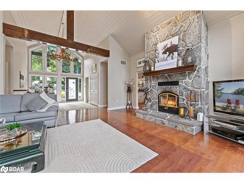 1011 Sugar Bush Road, Dwight, ON - Indoor Photo Showing Living Room With Fireplace