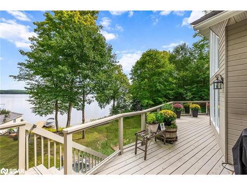 1011 Sugar Bush Road, Dwight, ON - Outdoor With Body Of Water With Deck Patio Veranda With Exterior