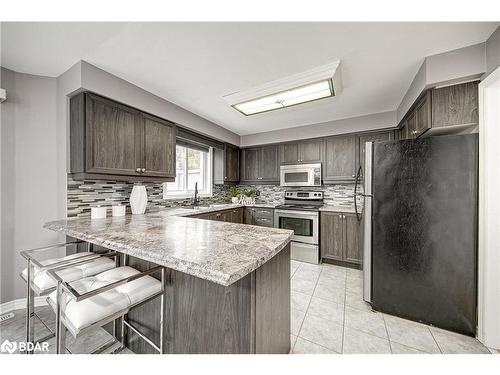 49 Eaglestone Lane, Barrie, ON - Indoor Photo Showing Kitchen With Upgraded Kitchen