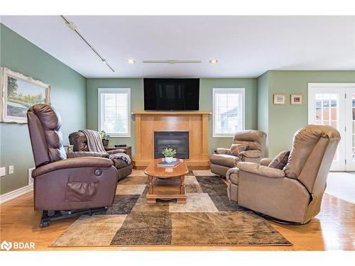 23 Bourgeois Beach Road, Victoria Harbour, ON - Indoor Photo Showing Living Room With Fireplace