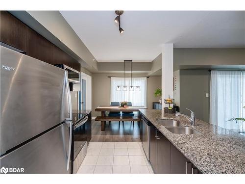 212-10 Culinary Lane, Barrie, ON - Indoor Photo Showing Kitchen With Double Sink